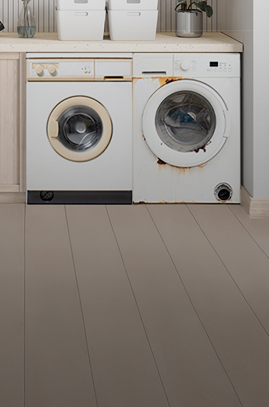 Laundry room with old appliances that need removal and recycling